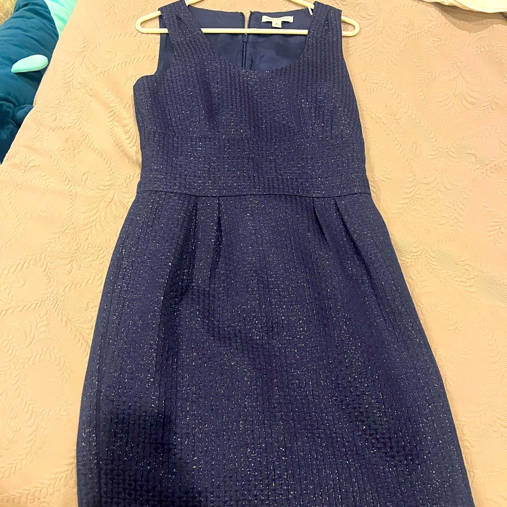 Navy dress perfect for a nice work event. Very subtle metallic weave.